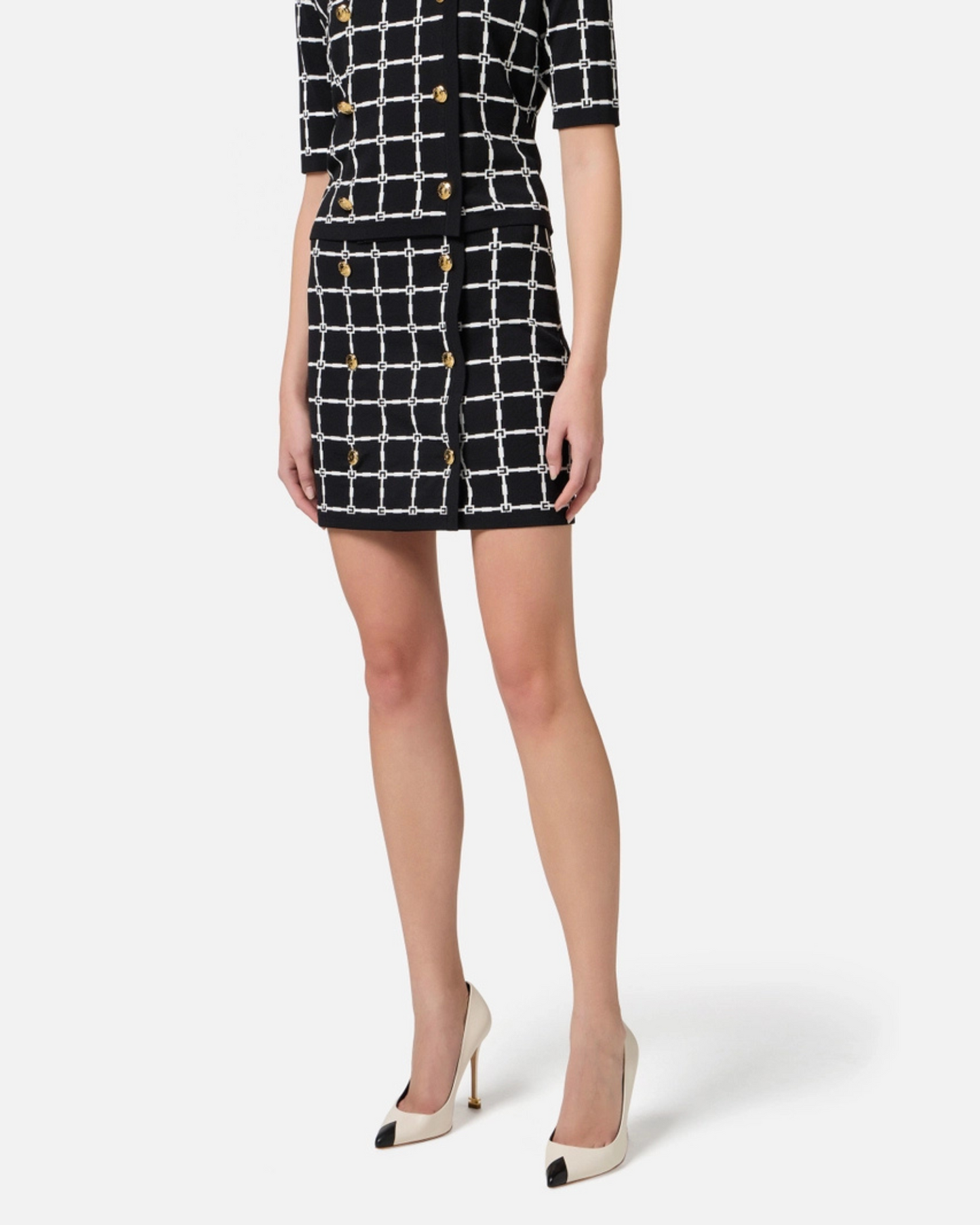 Minigonna in jacquard logo con bottoni dorati