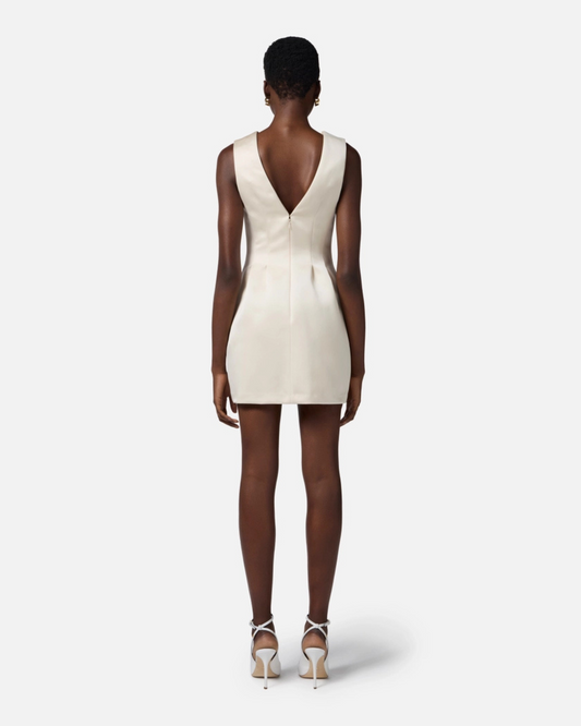 Abito in duchesse con fiocco in paillettes