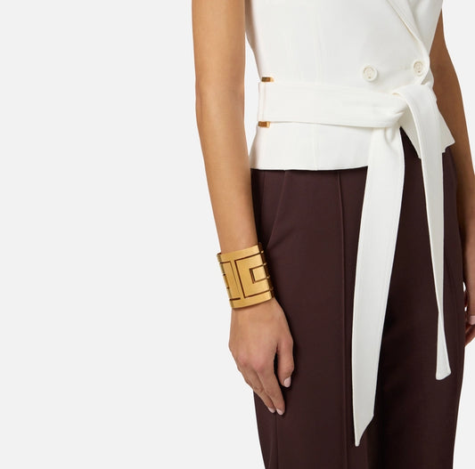 Bracciale cuff con traforature