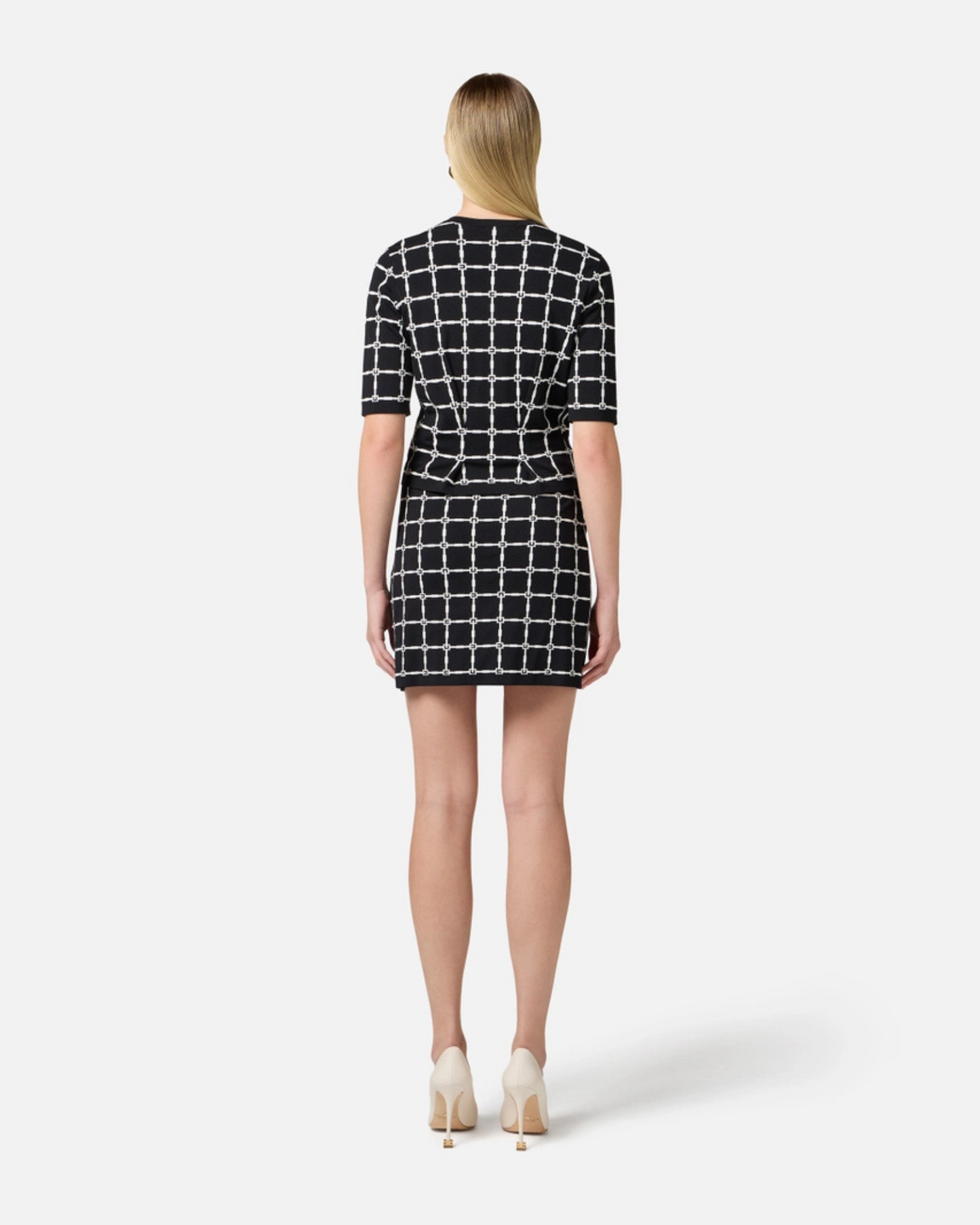 Minigonna in jacquard logo con bottoni dorati