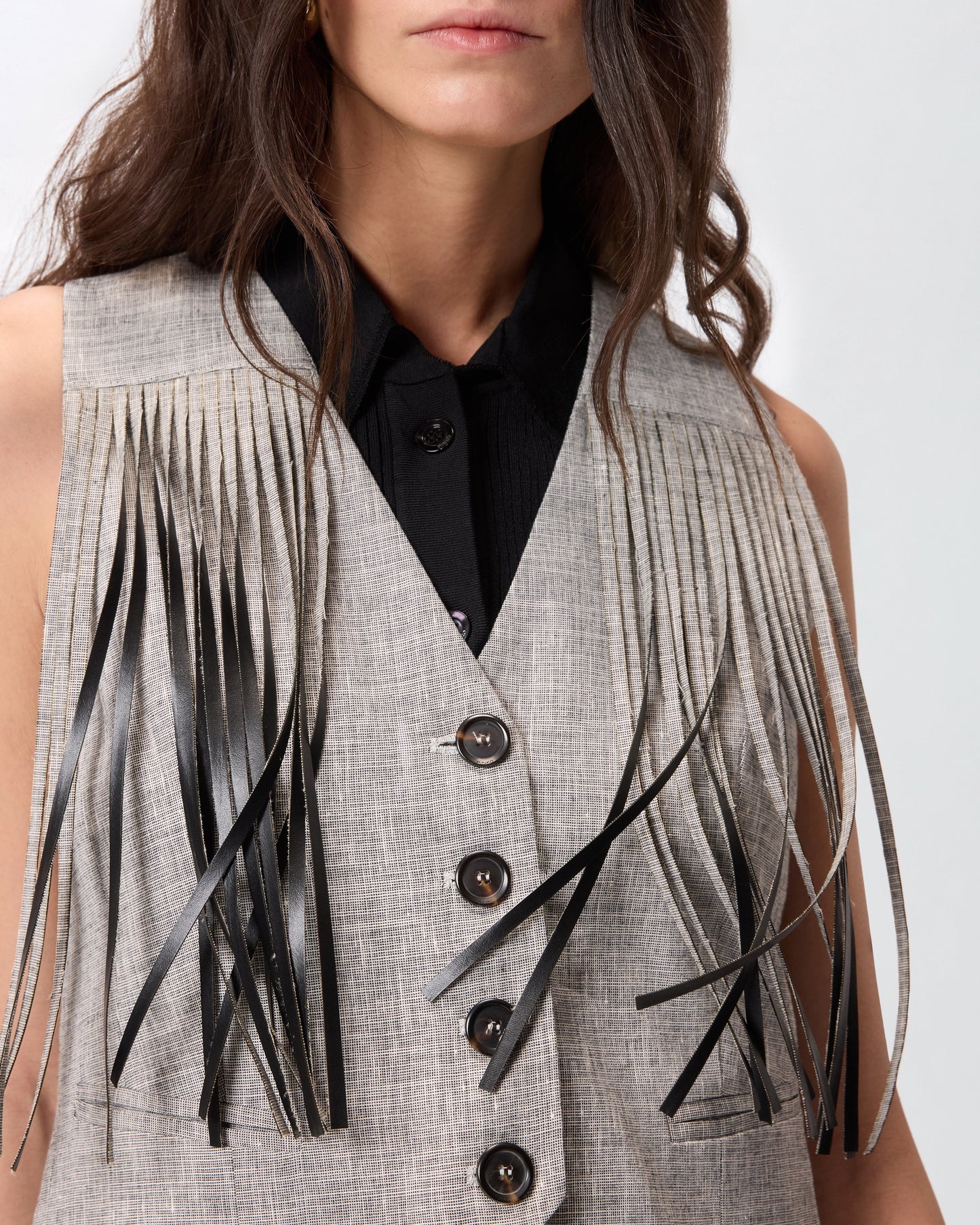 Gilet con frange
