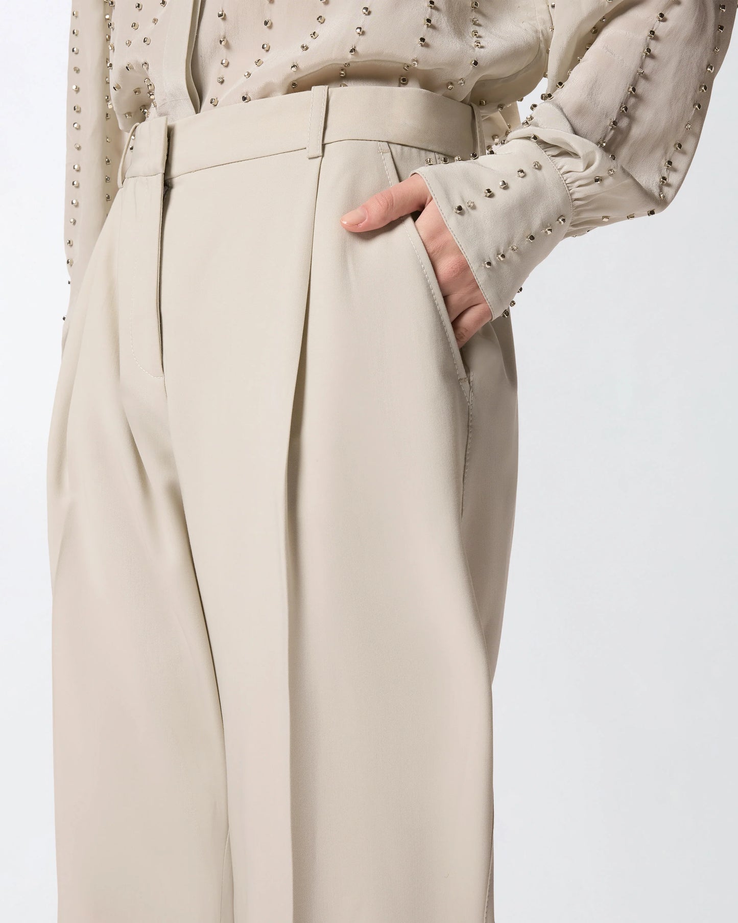 Pantaloni fluidi con piega stirata